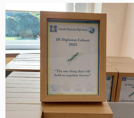 Framed certificate on a table reads IB Diploma Cohort 2025 - "The one thing that will hold us together forever."