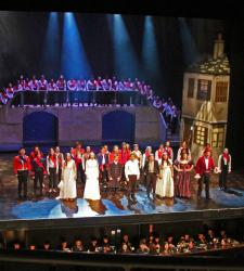 Students performing a play on stage